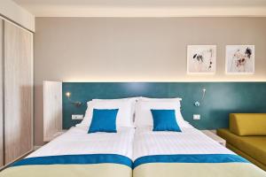 Hotel Sipar Plava Laguna客房内的一张或多张床位
