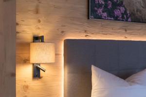Postel nebo postele na pokoji v ubytování Hotel Augarten