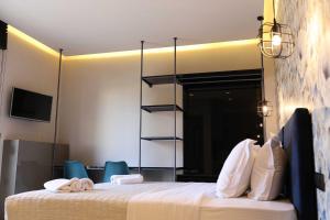 Кровать или кровати в номере 4 Seasons Luxury Apartments