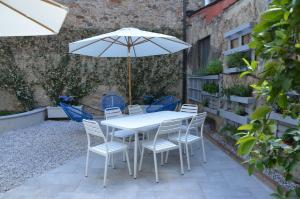 Patio nebo venkovní prostory v ubytování Dimora 16 Rooms & Garden