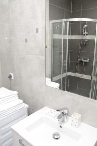Kúpeľňa v ubytovaní Apartamenty Mariela-Kołobrzeg z garażem
