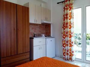 Kuchyň nebo kuchyňský kout v ubytování Potokia Rooms
