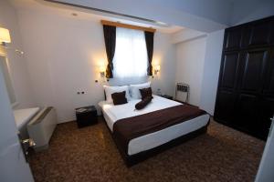 Cama o camas de una habitación en Hotel Drim