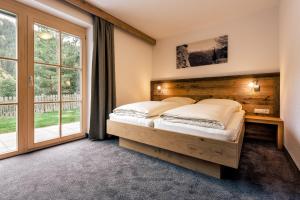Posteľ alebo postele v izbe v ubytovaní Appartements Alexander