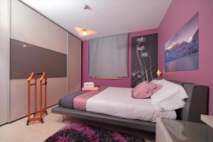 Ένα ή περισσότερα κρεβάτια σε δωμάτιο στο Affittacamere da Jasmina Venzone