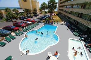an overhead view of a swimming pool in a parking lot at Oceanfront Viking Motel in Myrtle Beach