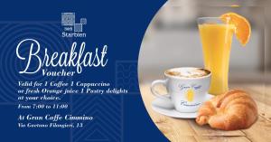 a flyer for breakfast turnover with a cup of coffee and a croissant at B&B Starbien in Naples