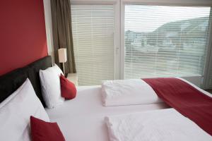 Кровать или кровати в номере Appartements am Binnenhafen
