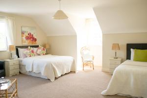 Кровать или кровати в номере Pairc Lodge