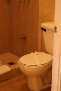 حمام في Coco Beach Hotel