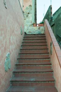 a set of stairs leading up to a building at B&B Santa Barbara in Iglesias
