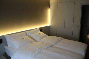 Postel nebo postele na pokoji v ubytování Hotel Astel