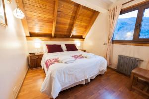 Postel nebo postele na pokoji v ubytování Tunqueley Hotel