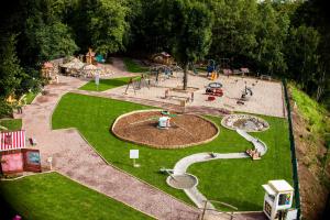 an aerial view of a park with a playground at Przystanek Bavaria - Sauny i parking w cenie! in Karpacz
