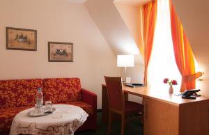 Posezení v ubytování Hotel Grünwald