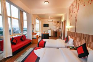 Rúm í herbergi á Hotel City Inn - Mountain View