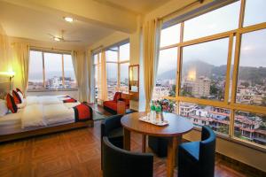 Rúm í herbergi á Hotel City Inn - Mountain View