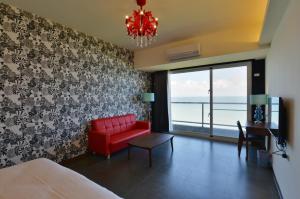 Een TV en/of entertainmentcenter bij Whitecaps B&B
