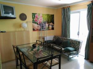 TV a/nebo společenská místnost v ubytování Hostal Alhambra Tarragona