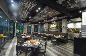 Restorāns vai citas vietas, kur ieturēt maltīti, naktsmītnē Shinta Mani Angkor & Bensley Collection Pool Villas