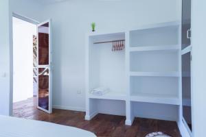 Voodi või voodid majutusasutuse Lazy Beach House toas