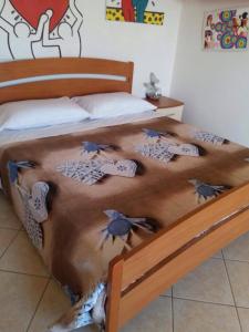 Posteľ alebo postele v izbe v ubytovaní villa lucia