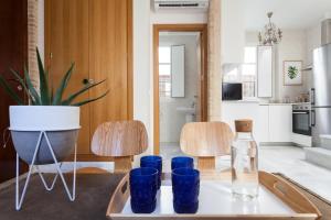 Telewizja i/lub zestaw kina domowego w obiekcie Ohliving Maestranza