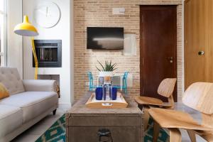 Telewizja i/lub zestaw kina domowego w obiekcie Ohliving Maestranza