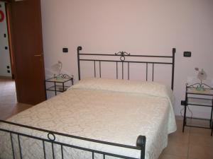 Postel nebo postele na pokoji v ubytování B&B Borgo Tre Case