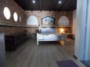 Postel nebo postele na pokoji v ubytování Sunset Suites