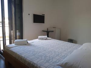 Cama ou camas em um quarto em Guest House Sombrero