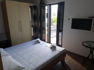 Cama ou camas em um quarto em Guest House Sombrero