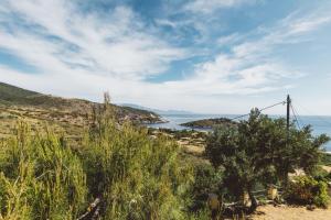 a view of the ocean from a hill at Panorama Apartments updated with infinity pool in Agios Nikolaos