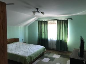 Postel nebo postele na pokoji v ubytování Casa Flori