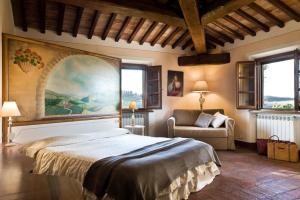 A bed or beds in a room at Poderi Arcangelo