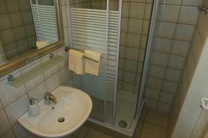 Koupelna v ubytování Haus Schwalbennest + 15 fotografií