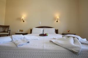 Postel nebo postele na pokoji v ubytování Aphrodite Hotel + 23 fotografií