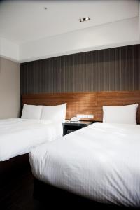 Letto o letti in una camera di KDM Hotel
