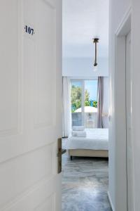 Letto o letti in una camera di Memories Beach Hotel
