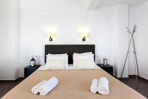 Letto o letti in una camera di Memories Beach Hotel