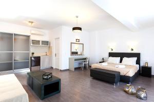 Letto o letti in una camera di Memories Beach Hotel