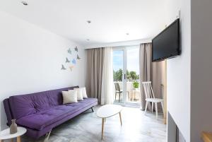 TV o dispositivi per l'intrattenimento presso Memories Beach Hotel