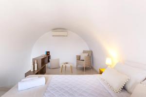 Letto o letti in una camera di Memories Beach Hotel