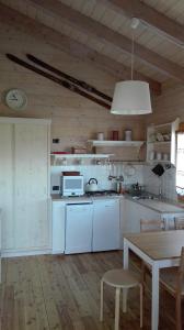 Kuchyň nebo kuchyňský kout v ubytování Chalet D'Antan