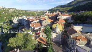 an aerial view of a town with buildings at Hotel Overland in Toirano