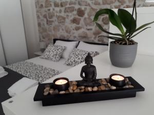 Postel nebo postele na pokoji v ubytování Zen studio in center of Rovinj