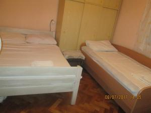 Ein Bett oder Betten in einem Zimmer der Unterkunft Villa Nada