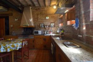Kuchyň nebo kuchyňský kout v ubytování Agriturismo Borgo Del Papa