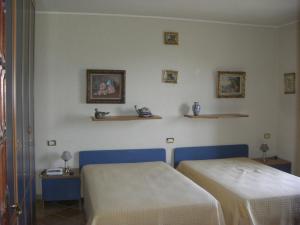 Ein Bett oder Betten in einem Zimmer der Unterkunft Villa Monrepos