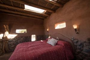 Katil atau katil-katil dalam bilik di Casa Chincol